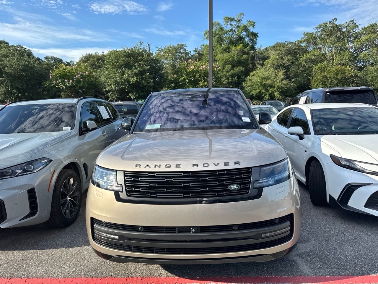 Used 2023 Gold Land Rover SE image 2