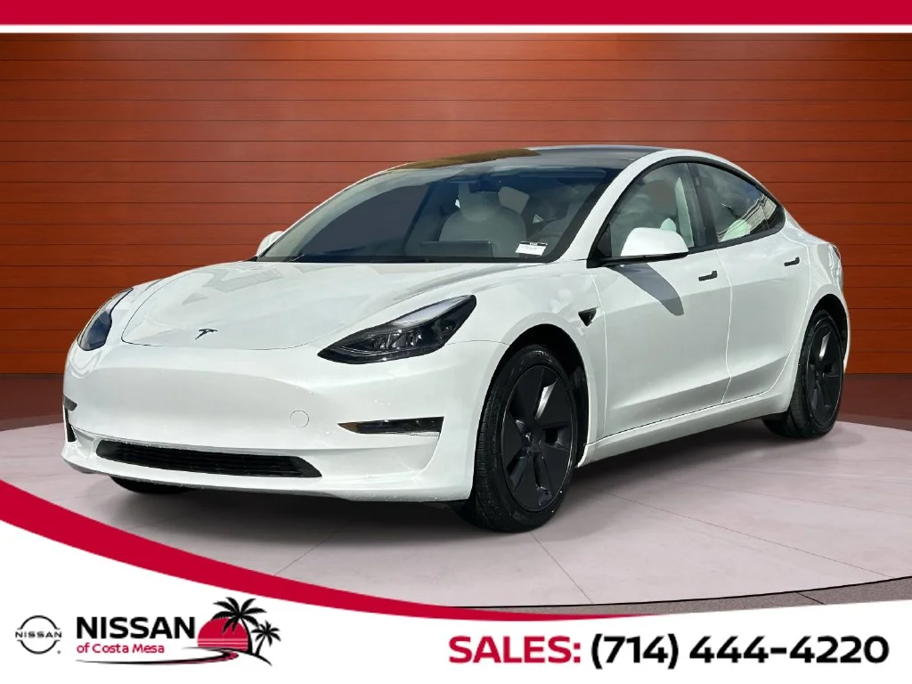 Used 2023 Pearl White Multi-Coat Tesla Base image 1