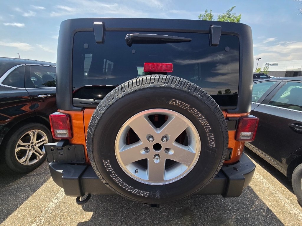 Used 2011 Mango Tango Pearlcoat Jeep Sport image 14