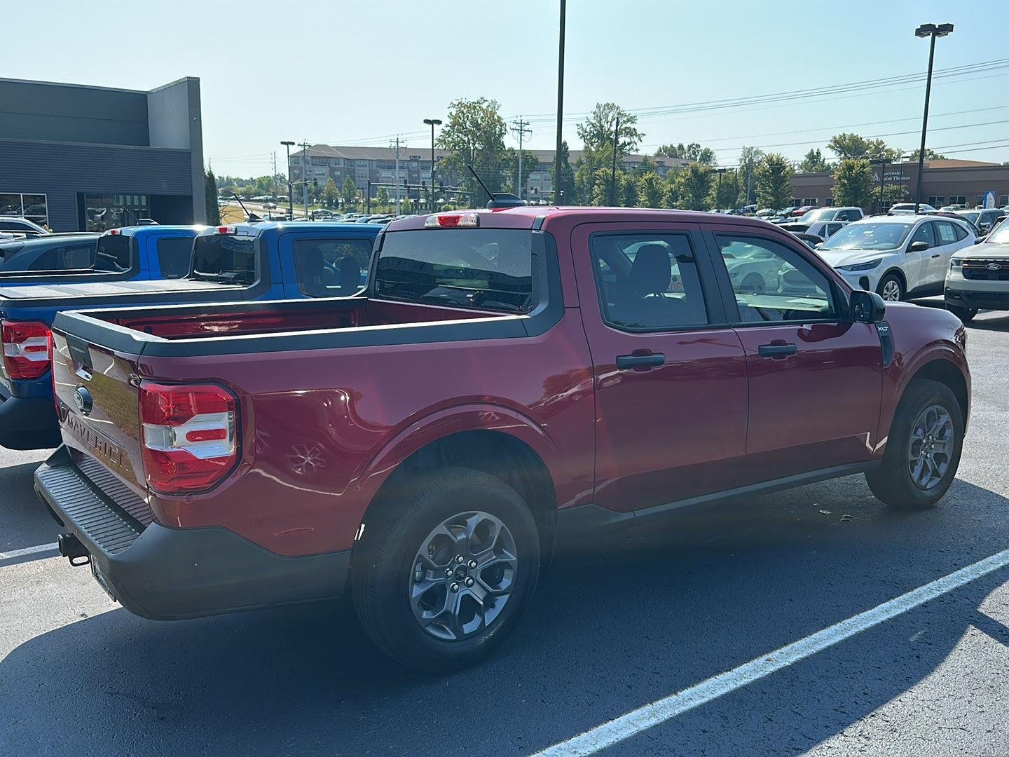 Used 2025 Ruby Red Metallic Tinted Clearcoat Ford XLT image 3