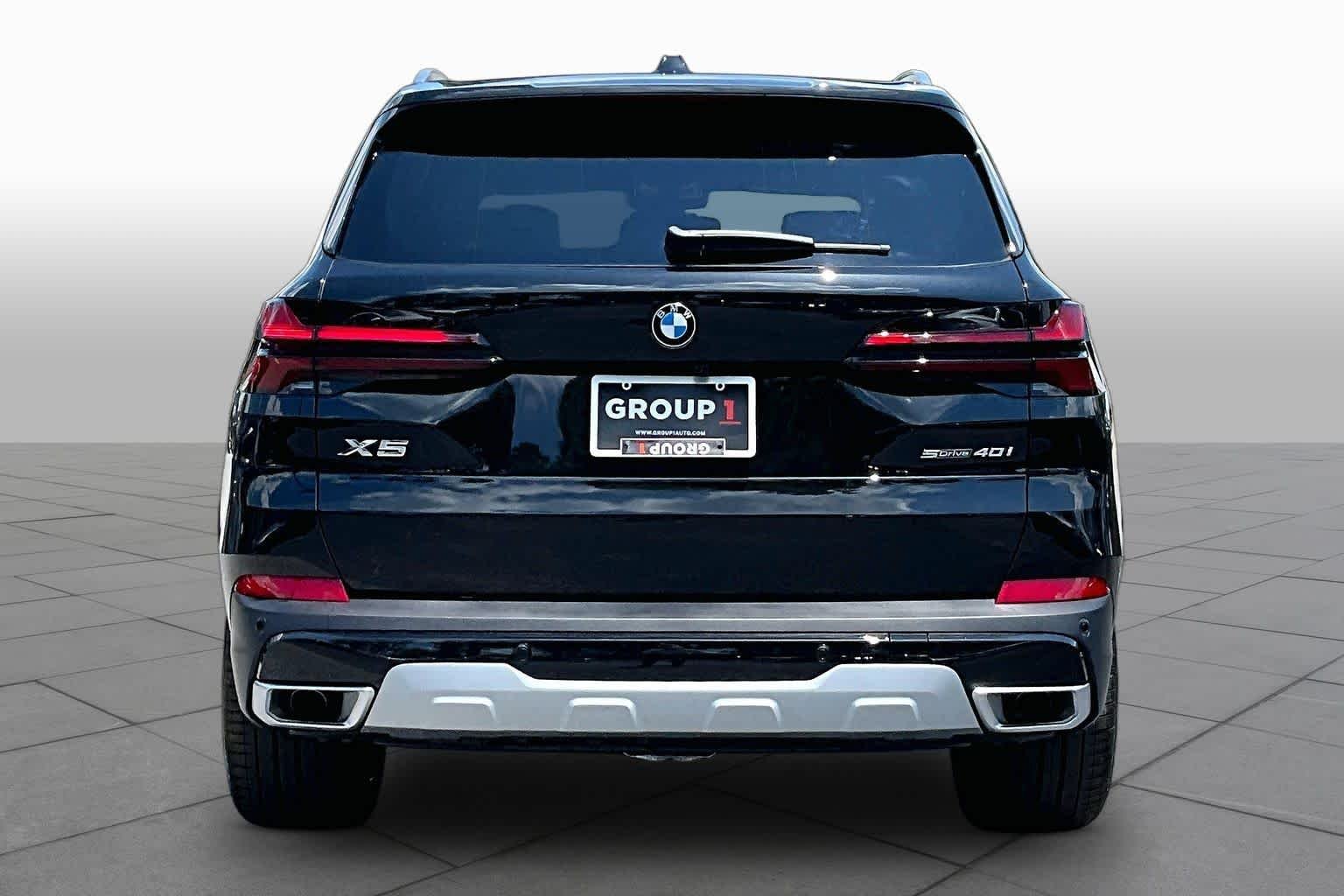 New 2026 Black Sapphire Metallic BMW sDrive40i image 4