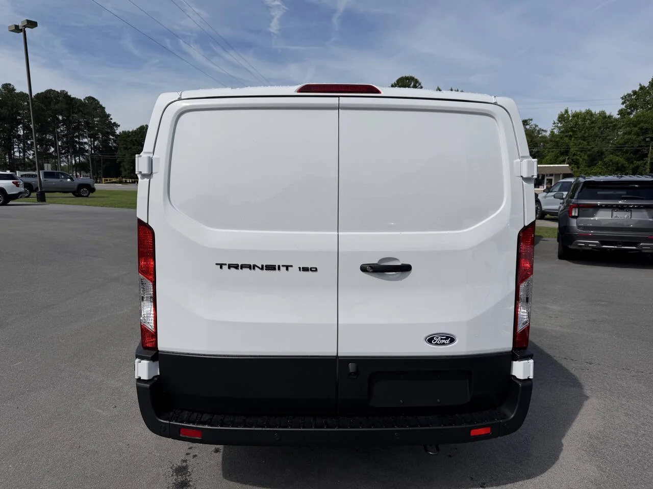 New 2026 White Ford 150 3dr LWB Low Roof Cargo Van image 19