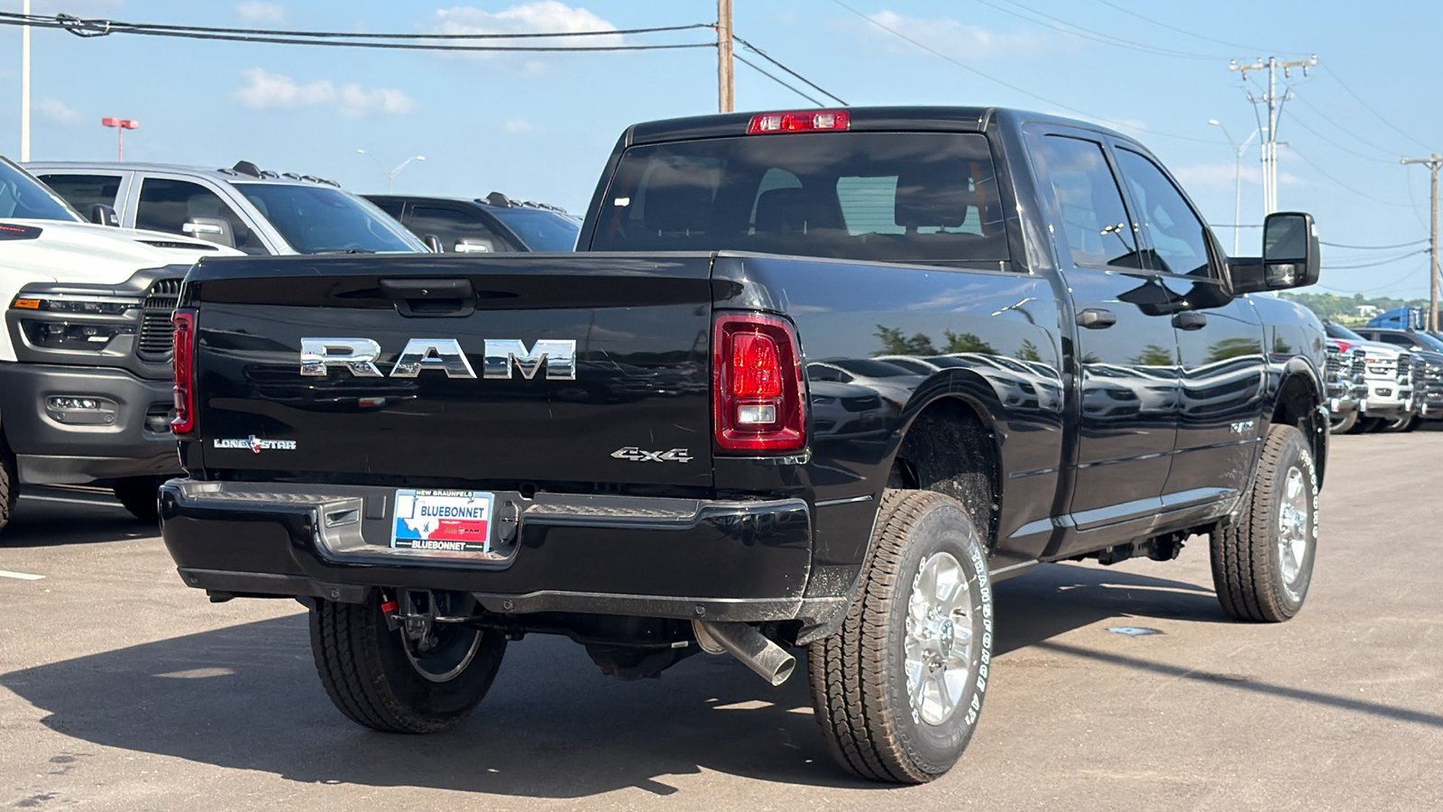 New 2026 Diamond Black Crystal Pearl-Coat Exterior Paint RAM Lone Star image 5