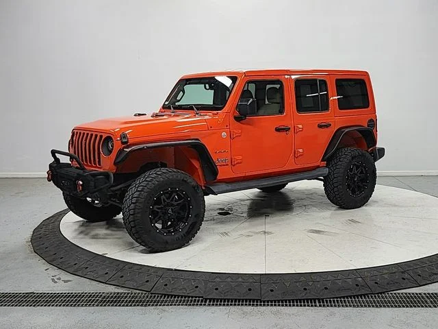 Used 2018 Orange Jeep Unlimited Sahara image 3