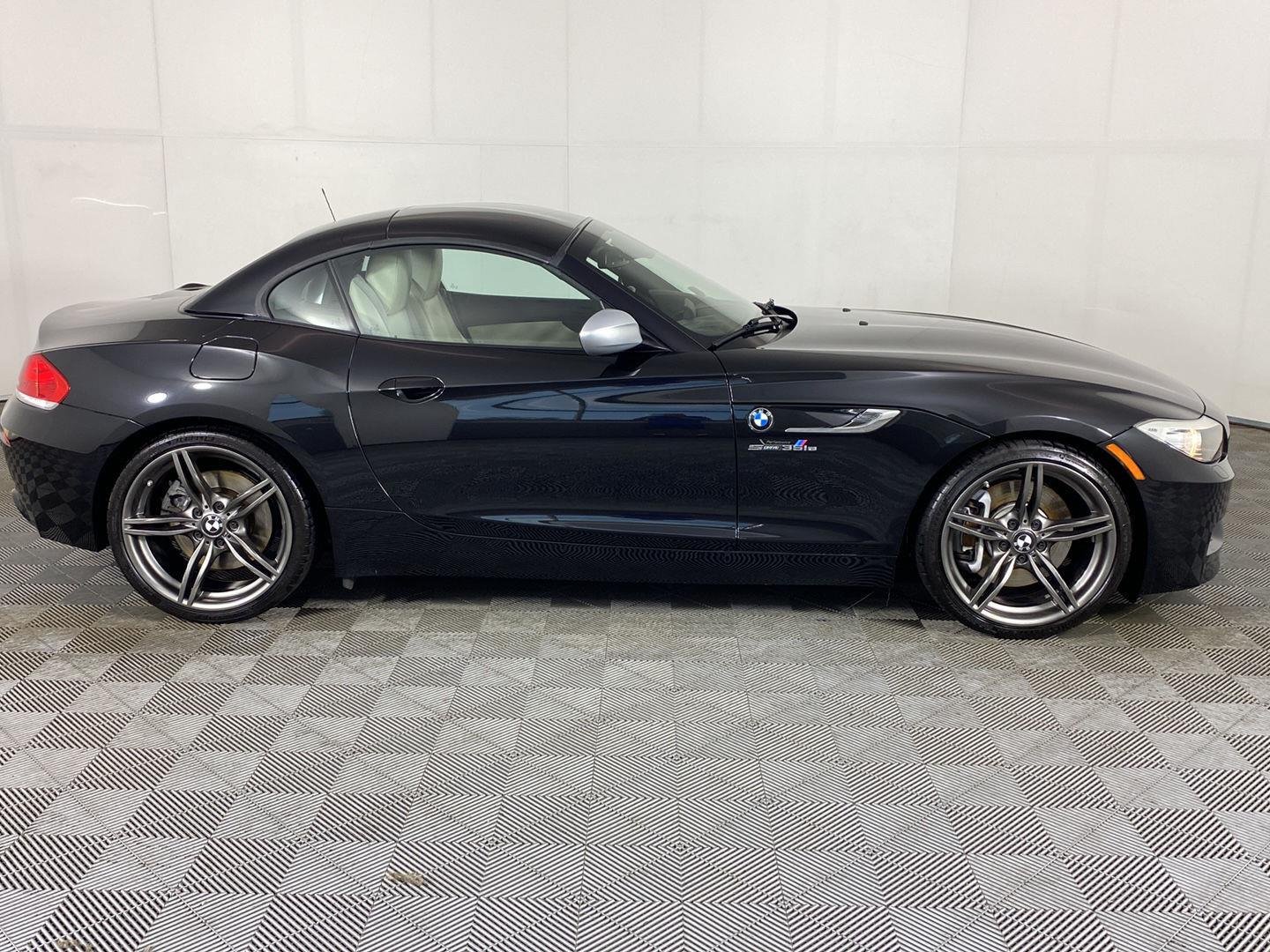 Used 2011 Black Sapphire Metallic BMW sDrive35is image 3
