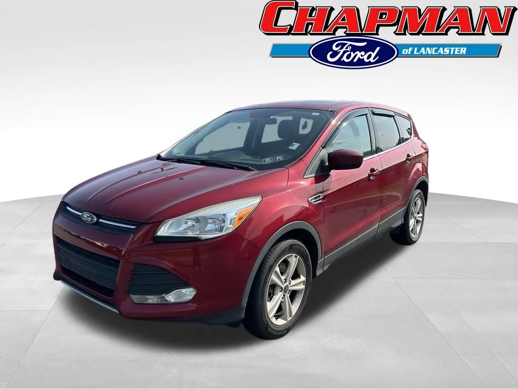 Used 2015 Ruby Red Metallic Ford SE image 1