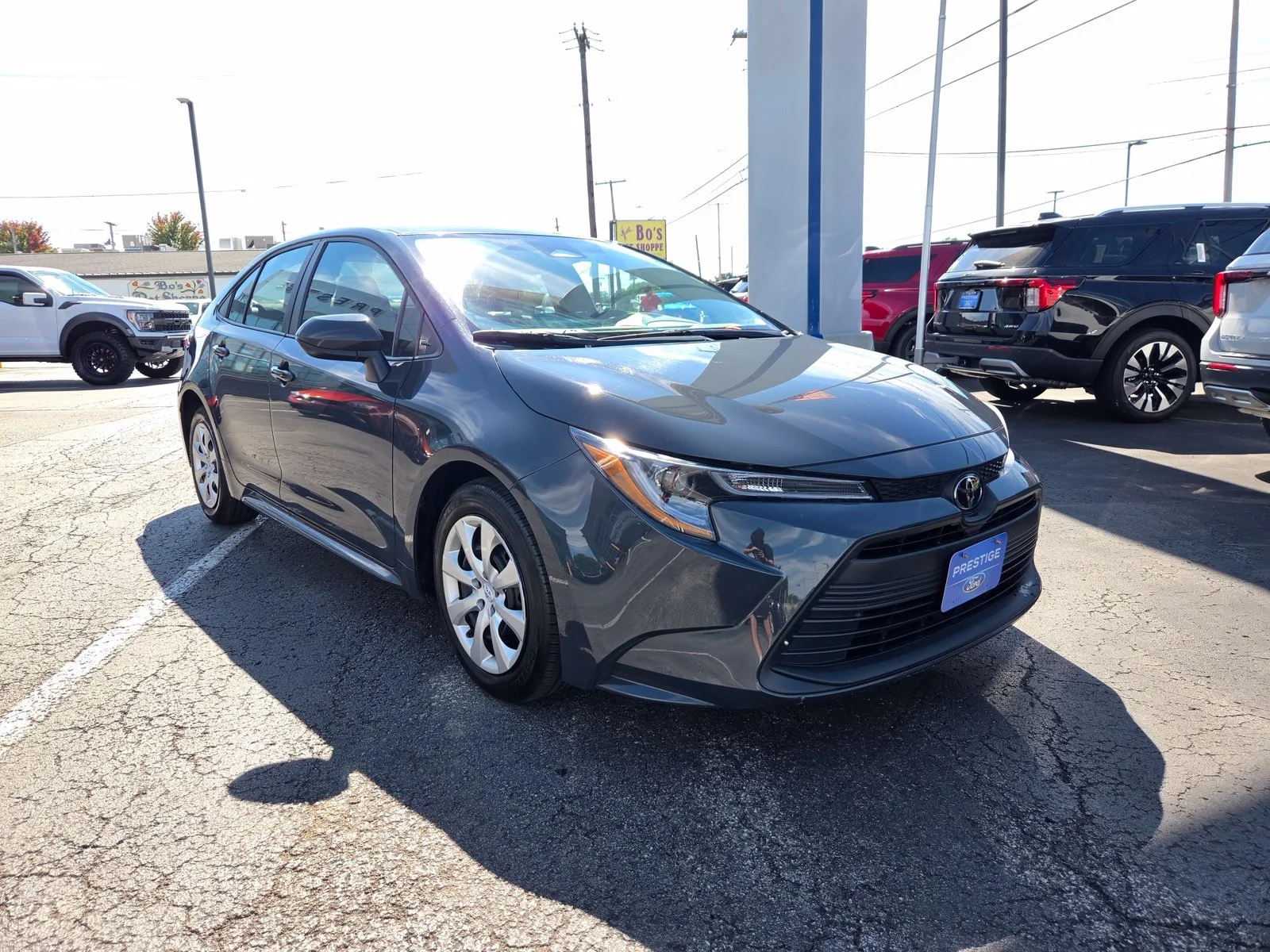 Used 2025 Black Toyota LE image 6