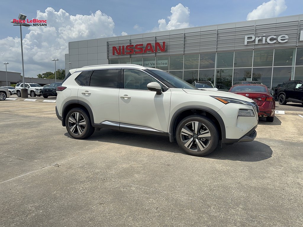 Used 2023 Pearl White TriCoat Nissan SL image 1
