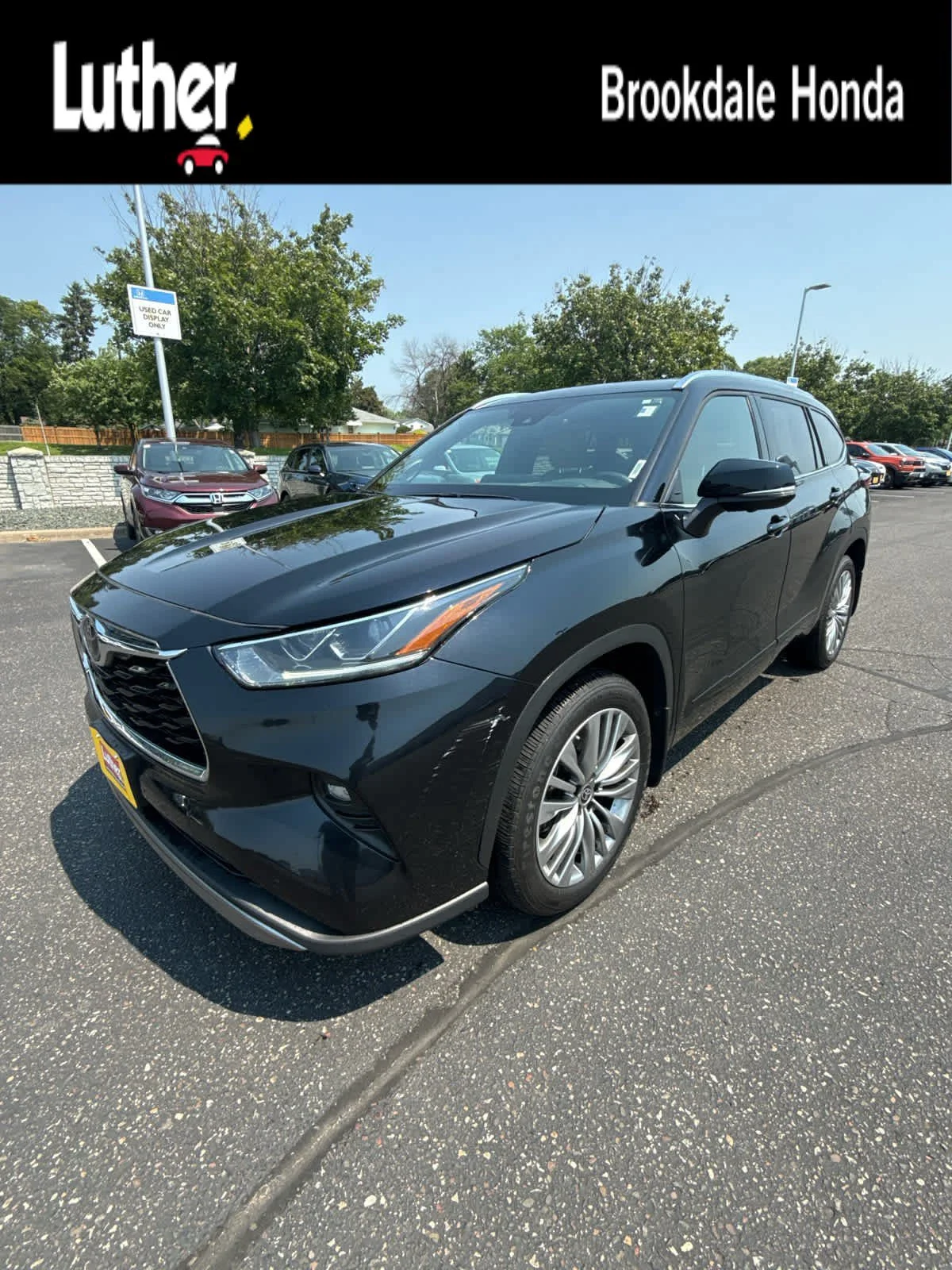 Used 2023 Midnight Black Metallic Toyota Platinum image 1