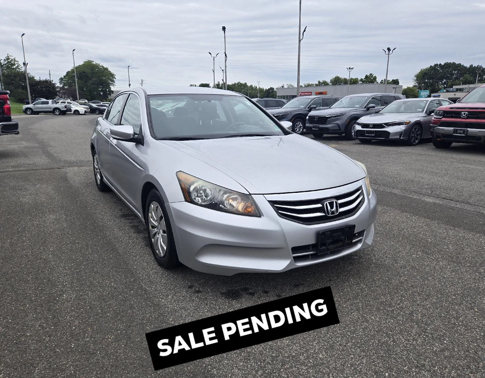 Used 2012 Alabaster Silver Metallic Honda LX image 1