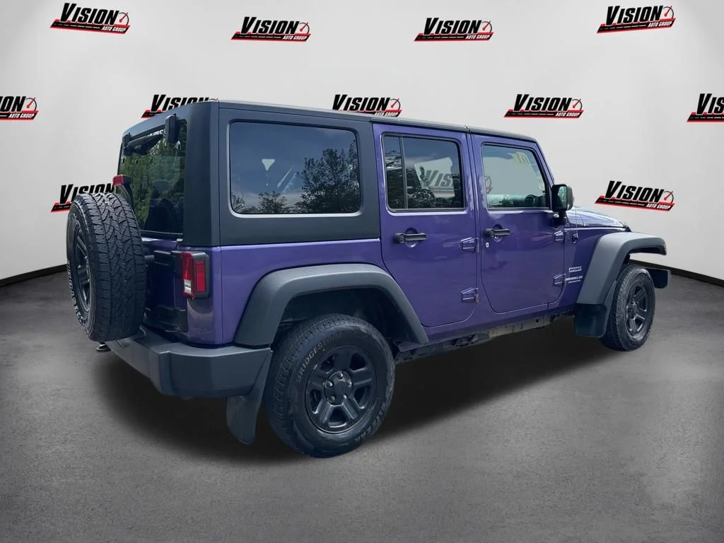 Used 2017 Purple Jeep Unlimited Sport image 5