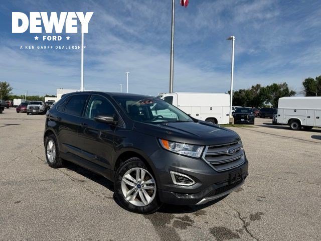 Used 2016 Magnetic Ford SEL image 1