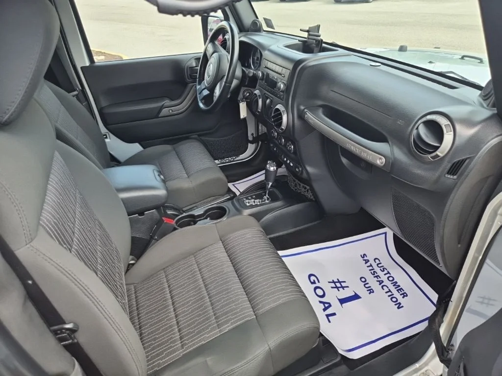 Used 2012 Bright Silver Metallic Jeep Sport image 12