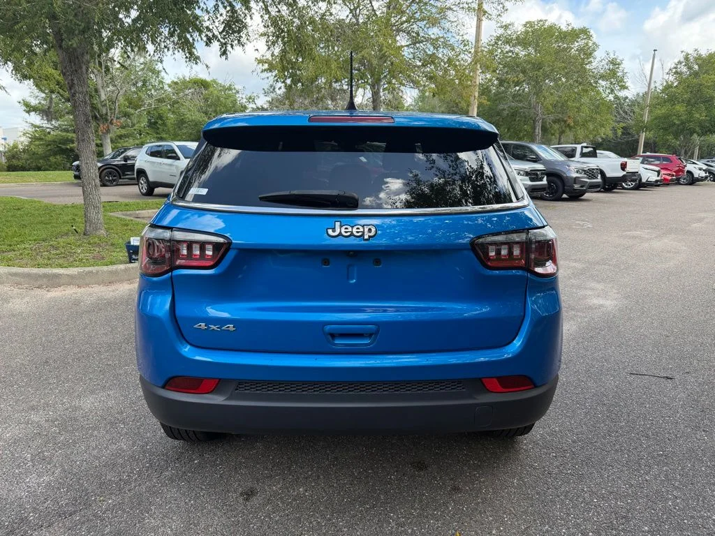 Used 2023 Laser Blue Jeep Sport image 5