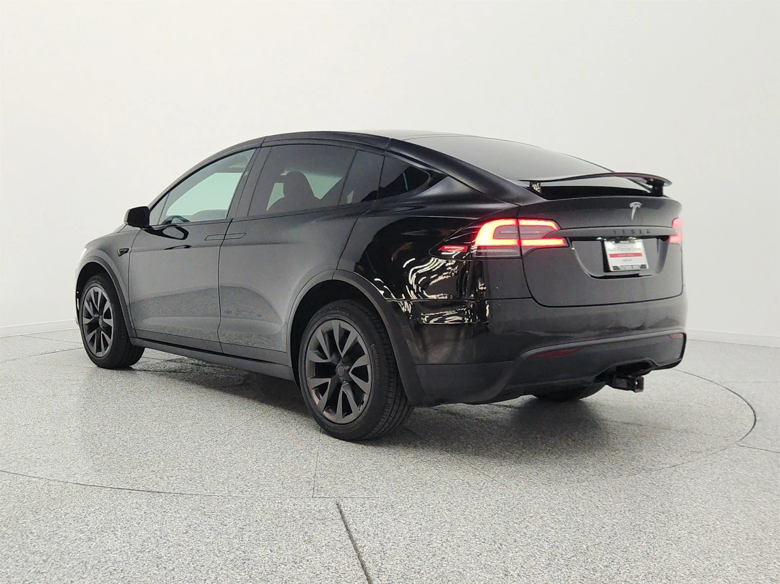 Used 2023 Solid Black Tesla AWD image 7