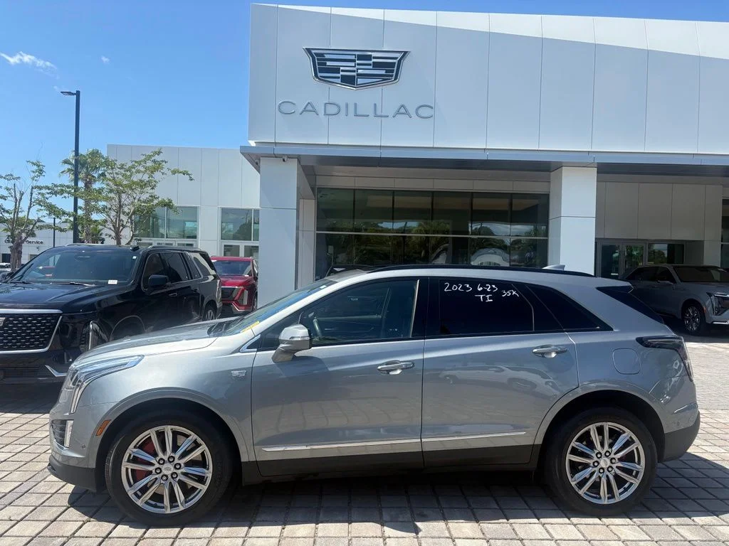 Certified Used 2023 Silver Metallic Cadillac Sport image 1
