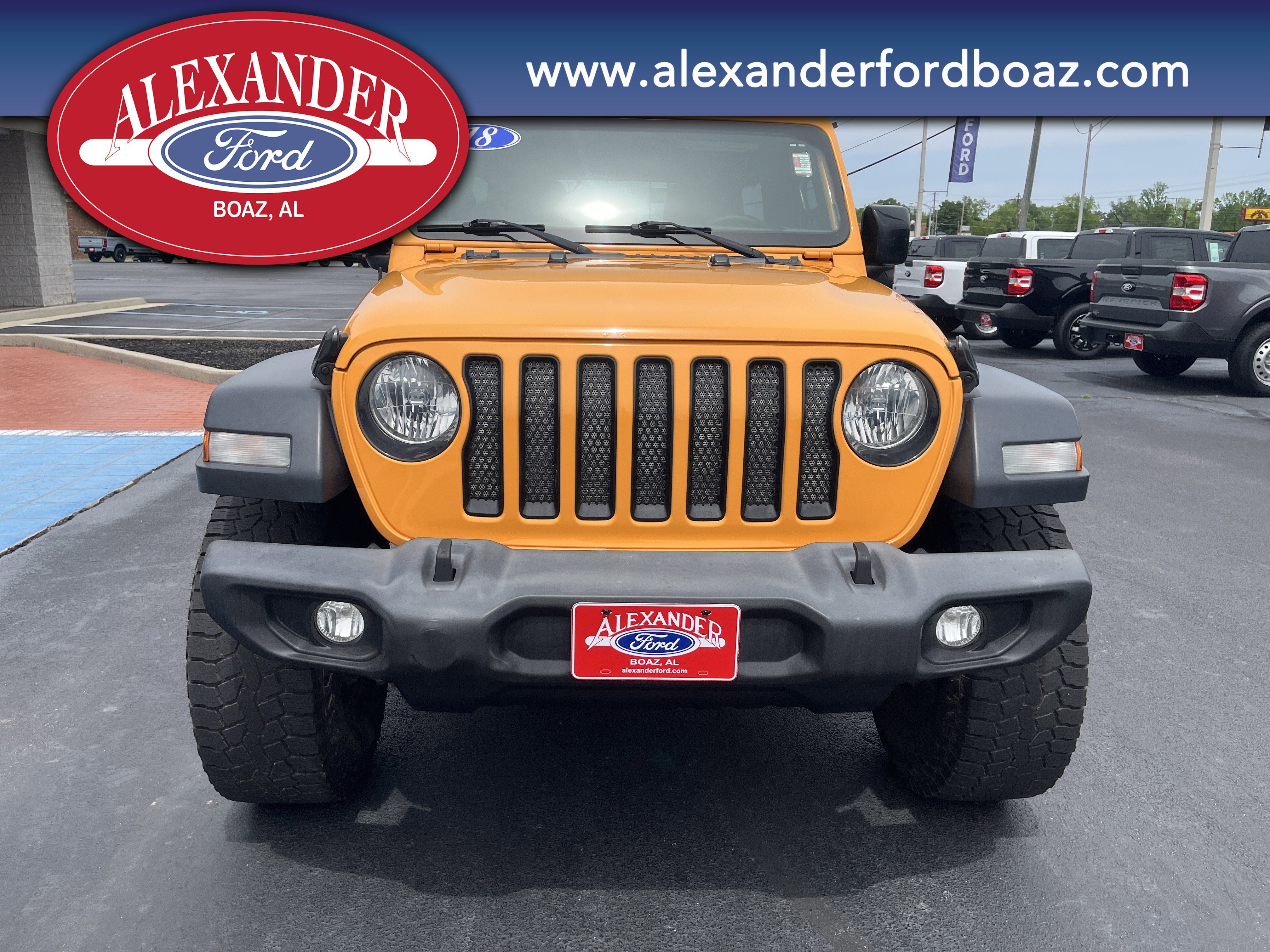 Used 2018 Orange Jeep Sport image 5