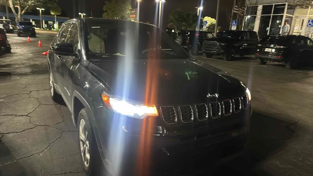 Used 2025 Black Jeep Sport image 2