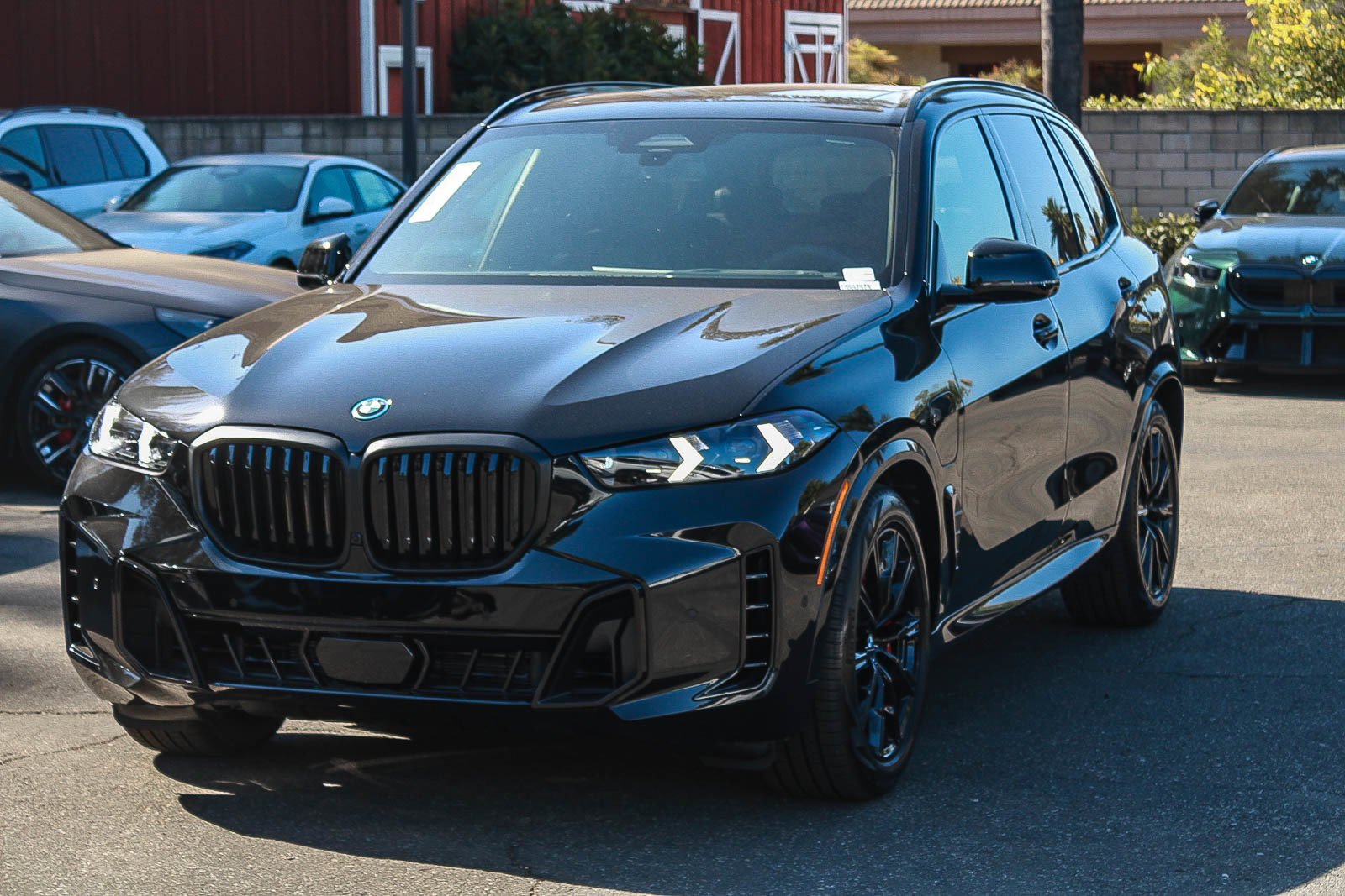 New 2026 Black Sapphire Metallic BMW xDrive50e image 3