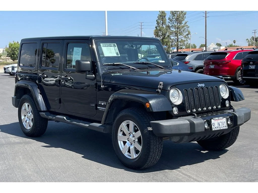 Used 2017 Black Clearcoat Jeep Sahara image 8