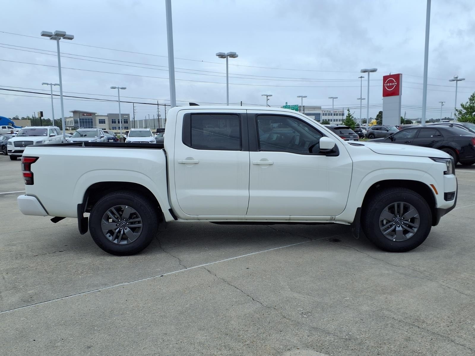 2026 Nissan Frontier SV White at Robbins Nissan