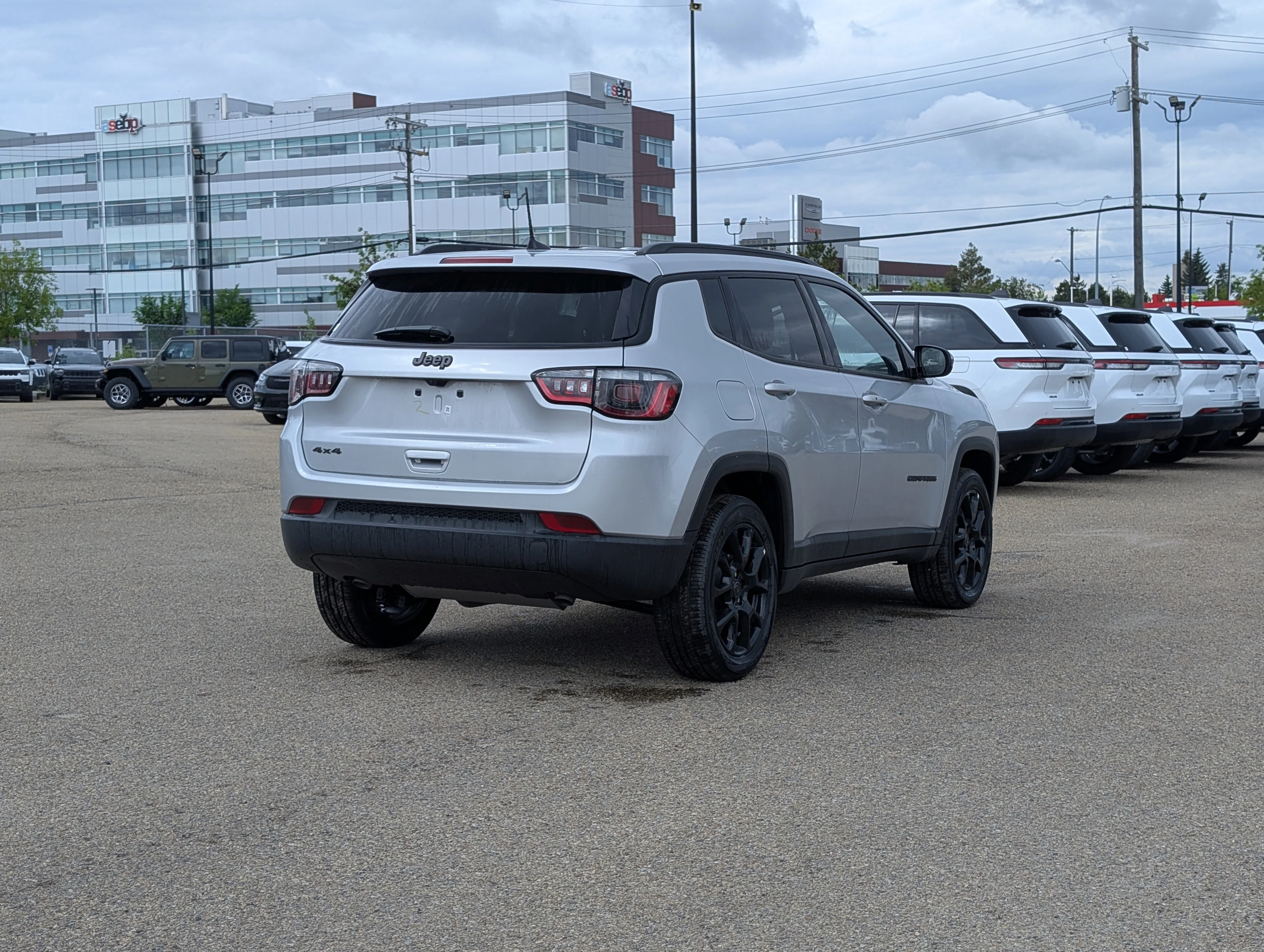 New 2026 Silver Zynith Metallic Jeep North image 7