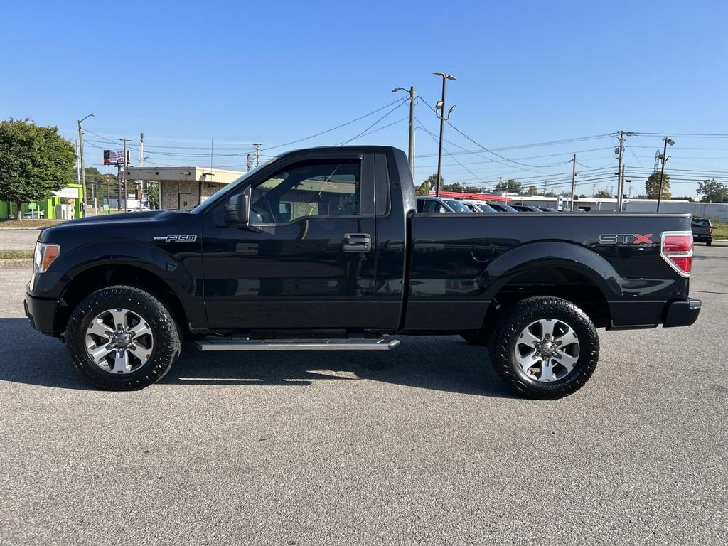 Used 2013 Tuxedo Black Metallic Ford STX image 7
