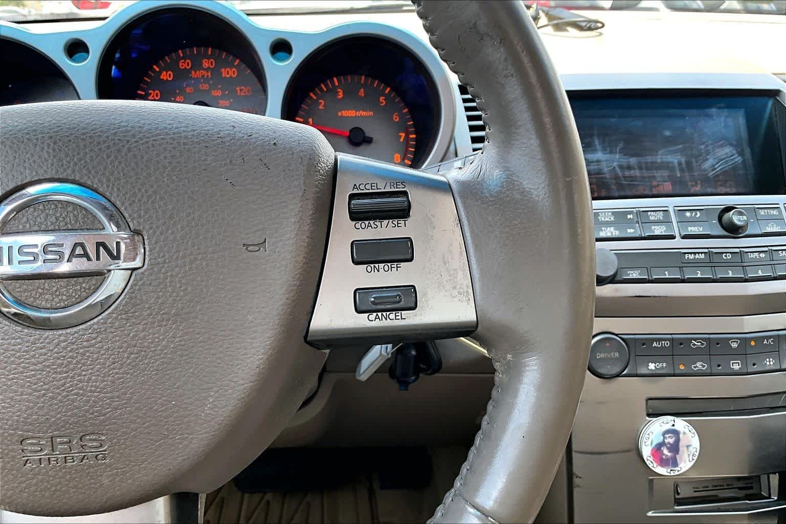 Used 2004 Red Opulence Metallic Nissan SE image 24