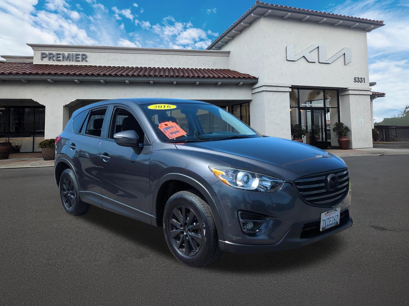 Used 2016 Mazda CX-5 Touring with VIN JM3KE2CY7G0857182 for sale in Carlsbad, CA