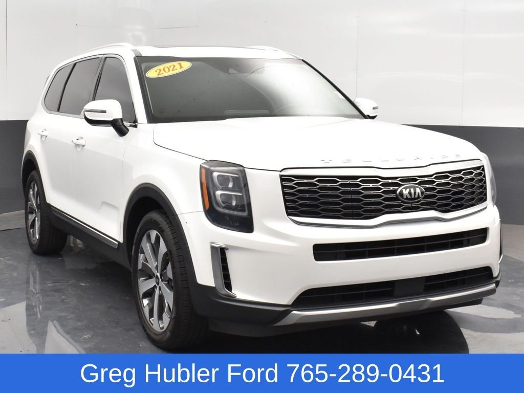 Used 2021 White Kia EX image 1