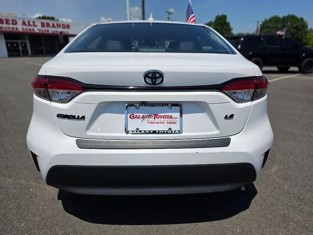 Used 2024 White Toyota LE image 6