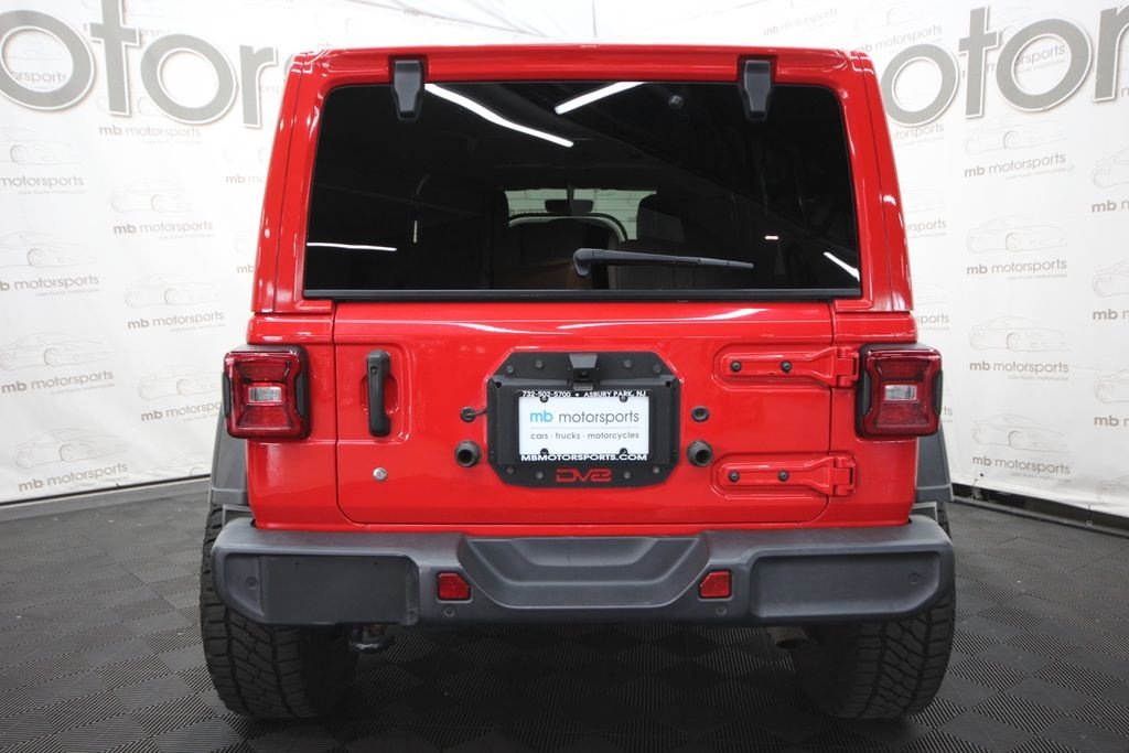 Used 2019 Red Jeep Unlimited Sahara image 5
