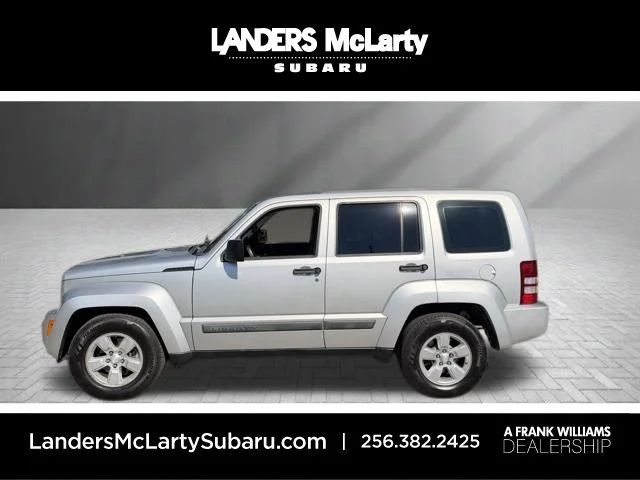 Used 2010 Silver Jeep Sport image 1