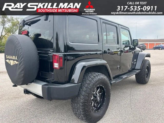 Used 2014 Black Jeep Unlimited Sahara image 5