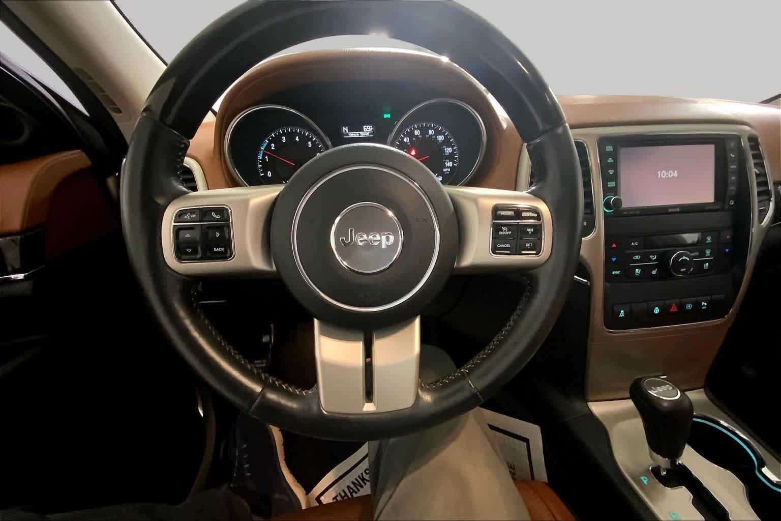 Used 2011 White Gold Jeep Overland Summit image 5