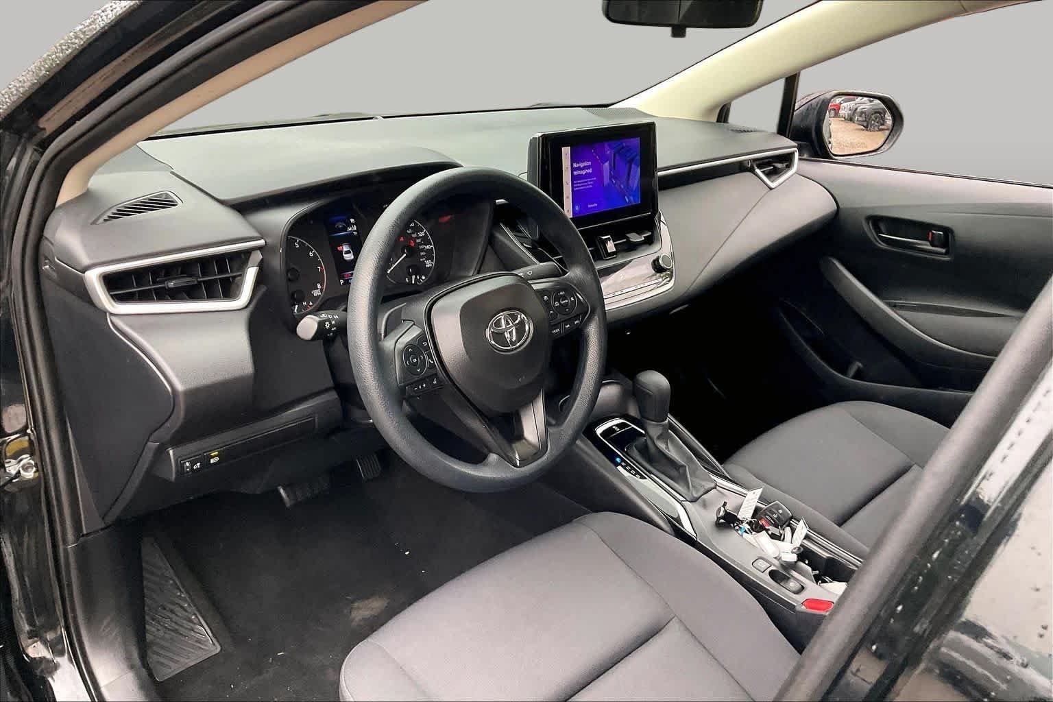 Used 2024 Midnight Black Metallic Toyota LE image 17