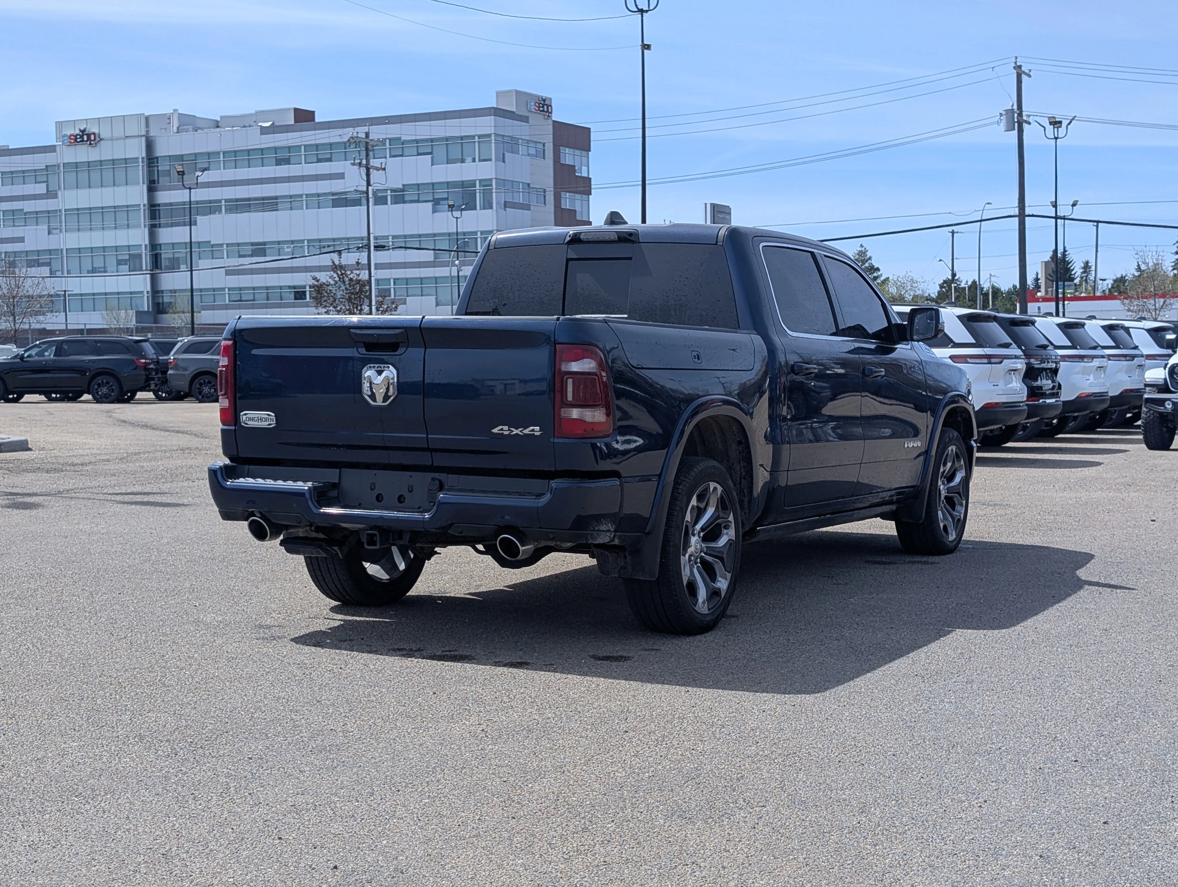 Used 2024 Patriot Blue Pearl Ram Limited Longhorn image 7