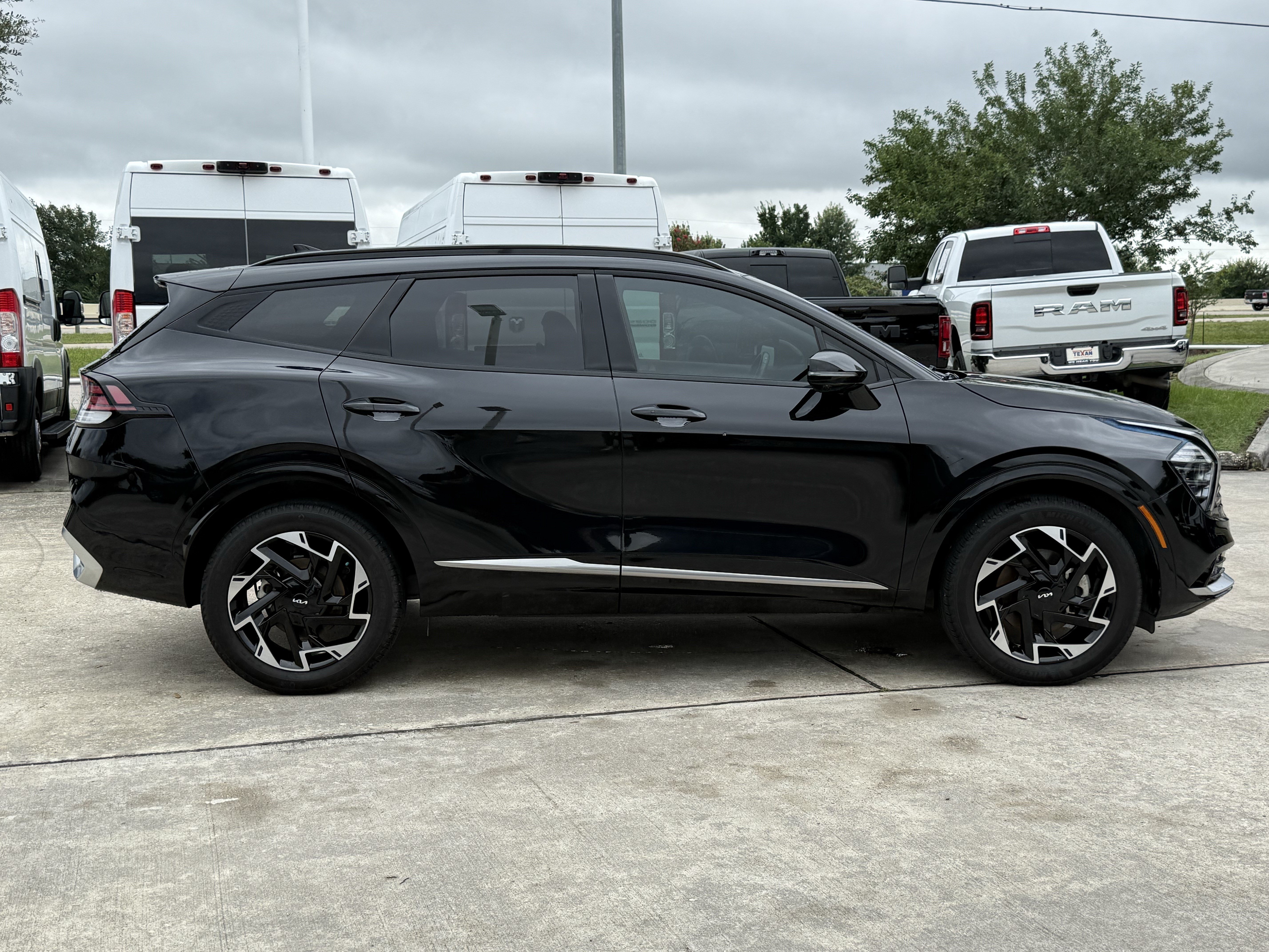 Used 2024 Ebony Black Kia SX-Prestige image 3