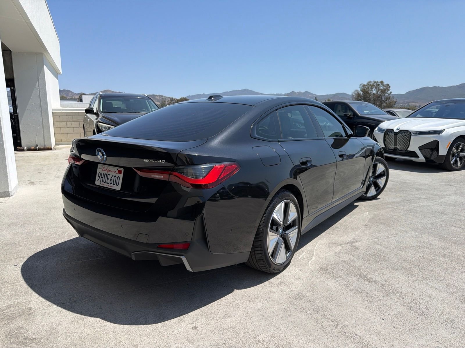 Certified Used 2023 Black Sapphire Metallic BMW eDrive40 image 4
