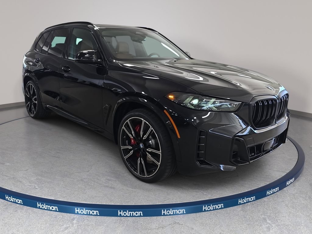 New 2026 Black Sapphire Metallic BMW M60i image 3