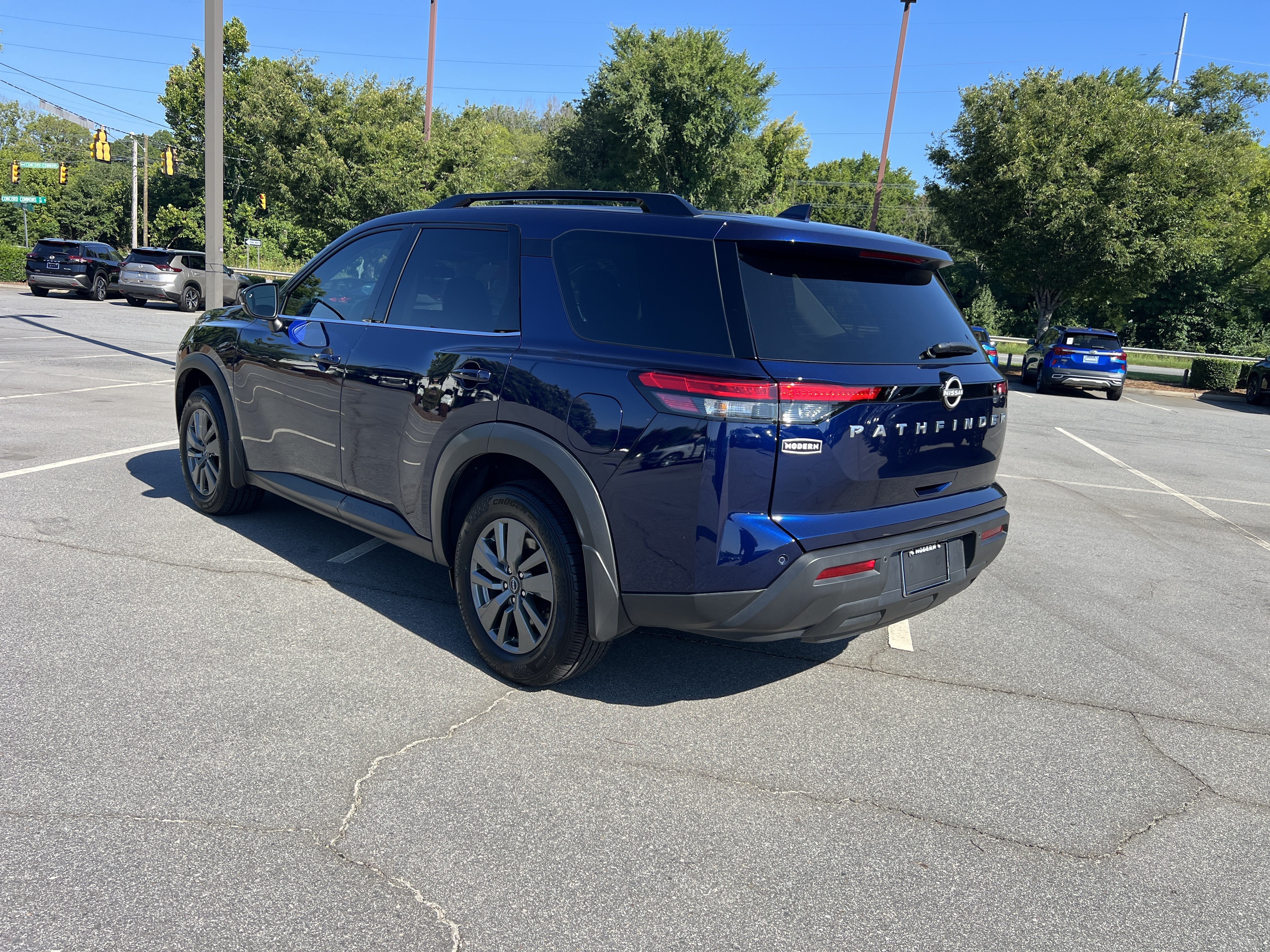 Used 2025 Deep Ocean Blue Pearl Nissan SV image 7