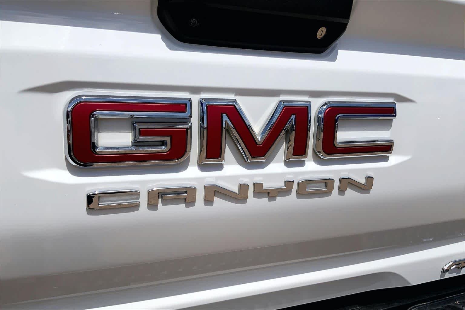 Used 2024 Summit White GMC 4WD AT4 image 59