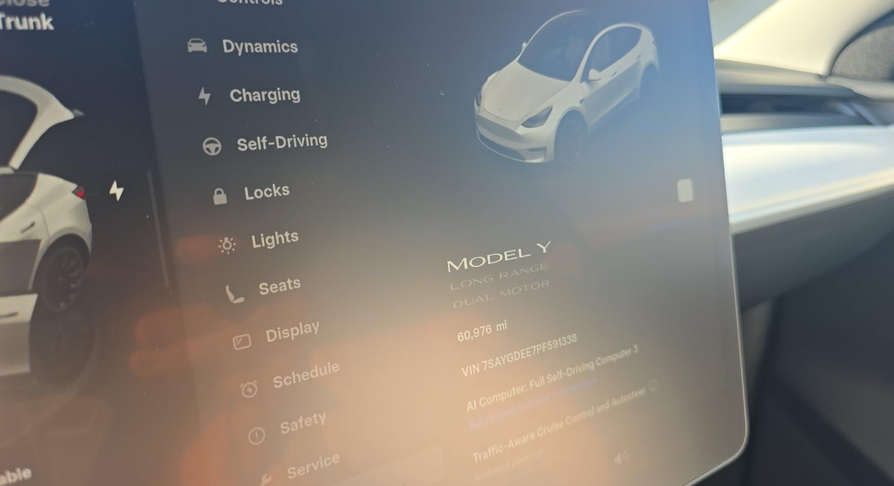 Used 2023 Tesla Model Y Long Range with VIN 7SAYGDEE7PF591338 for sale in Kansas City