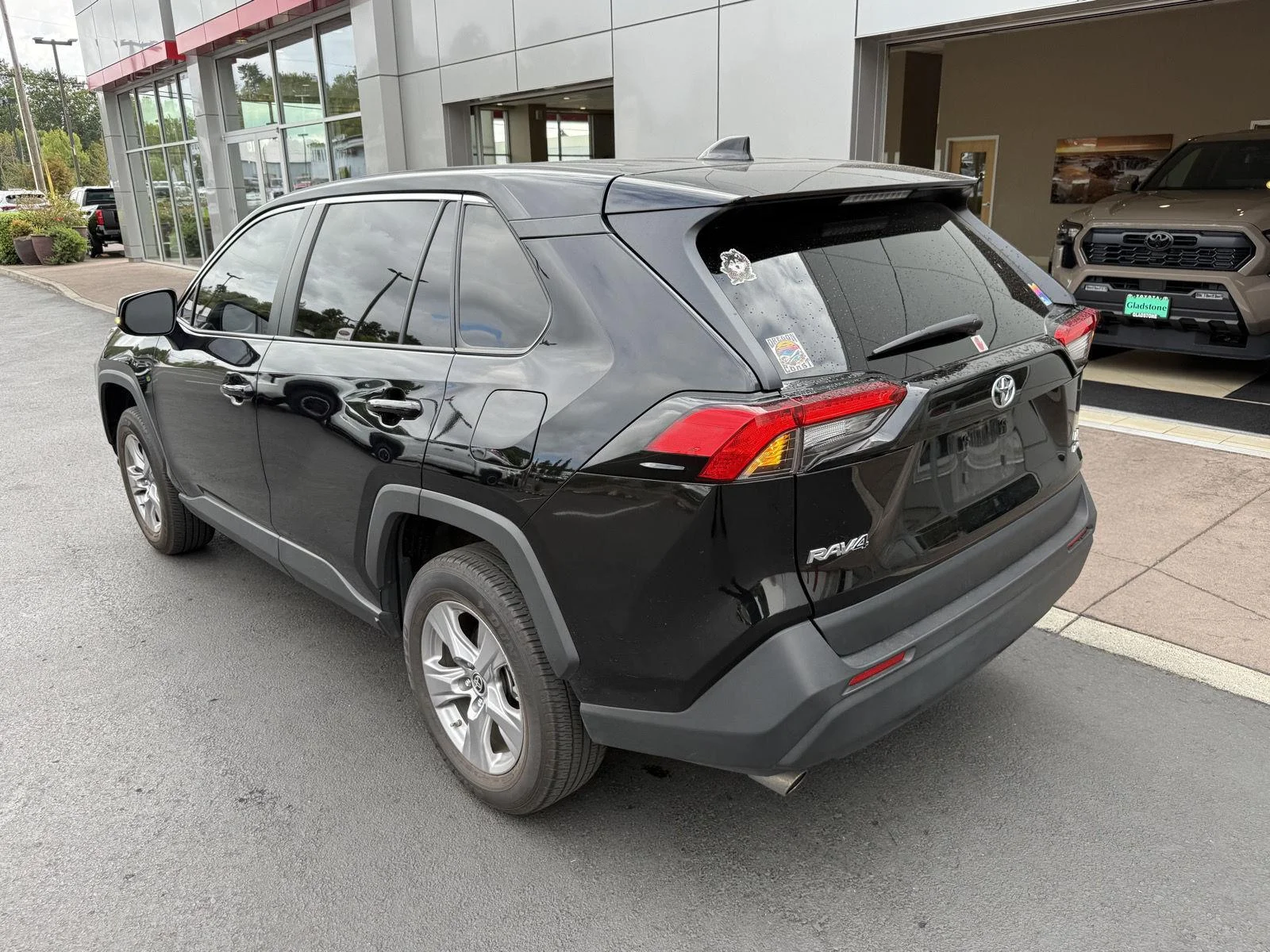 Used 2025 Midnight Black Metallic Toyota LE image 3