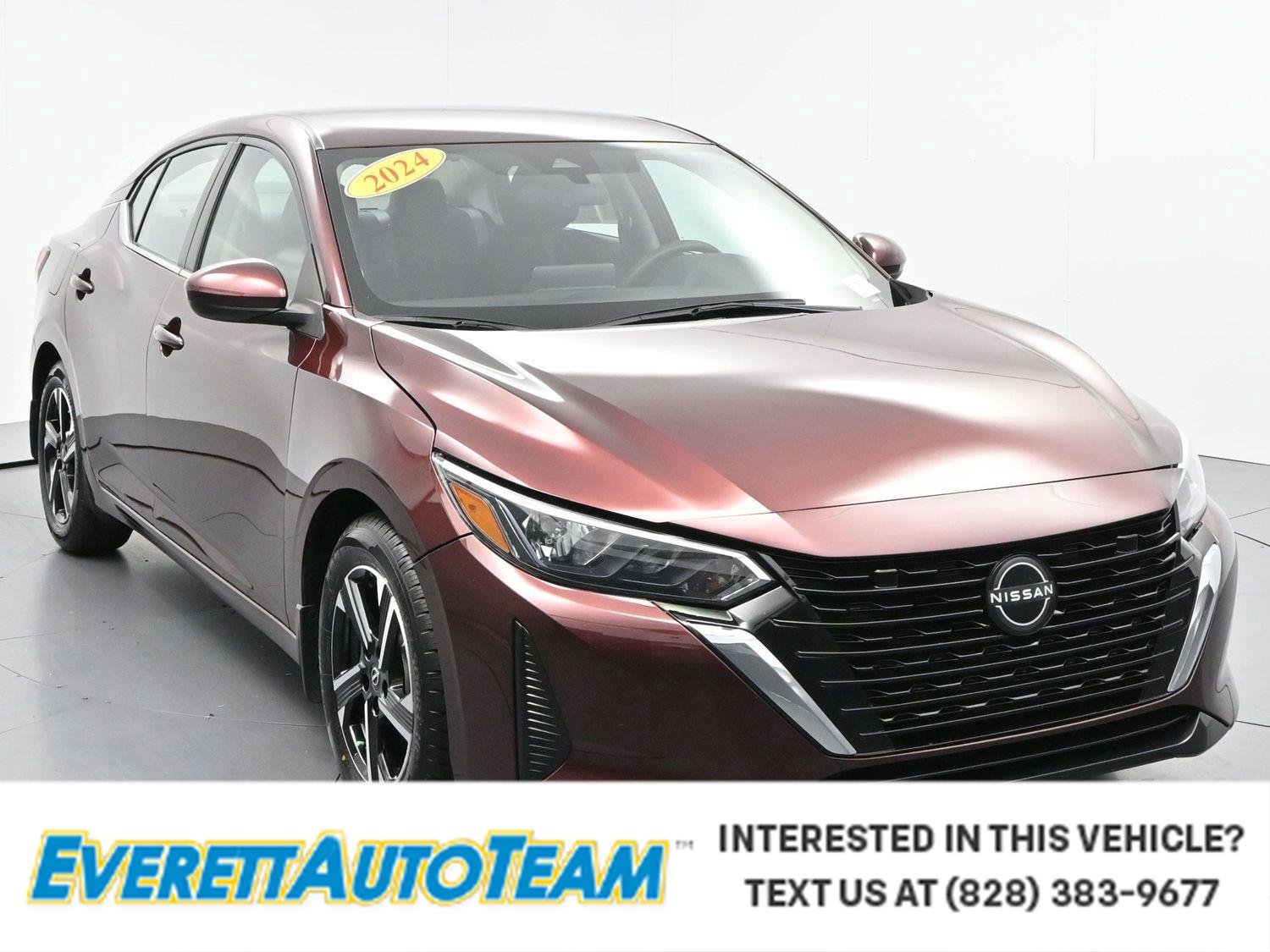 Used 2024 Rosewood Metallic Nissan SV image 1