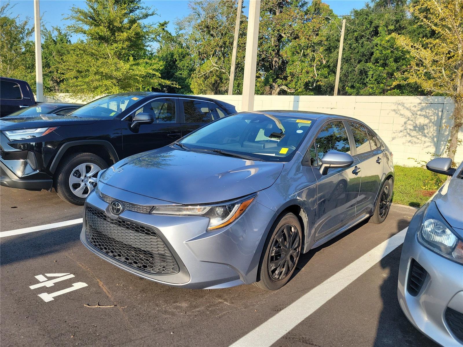 Used 2022 Celestite Gray Metallic Toyota LE image 1