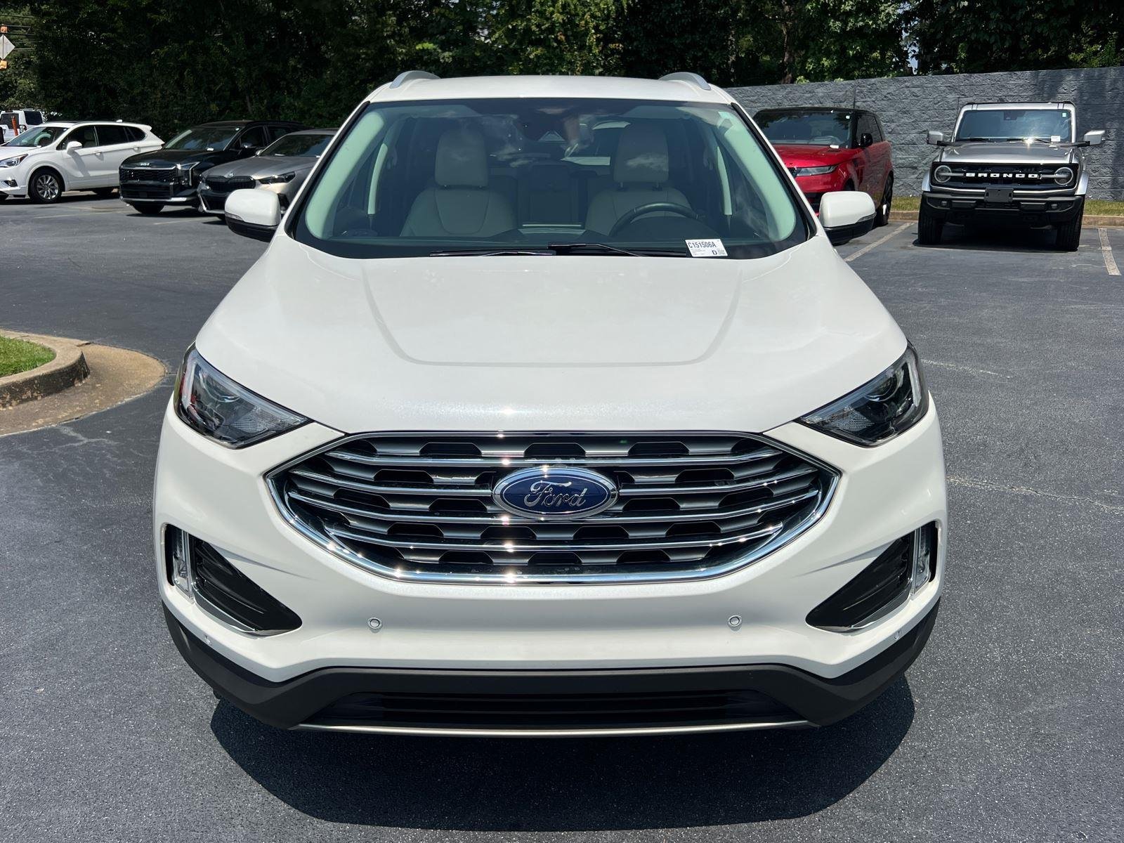 Used 2022 Star White Metallic Tri-Coat Ford Titanium image 2