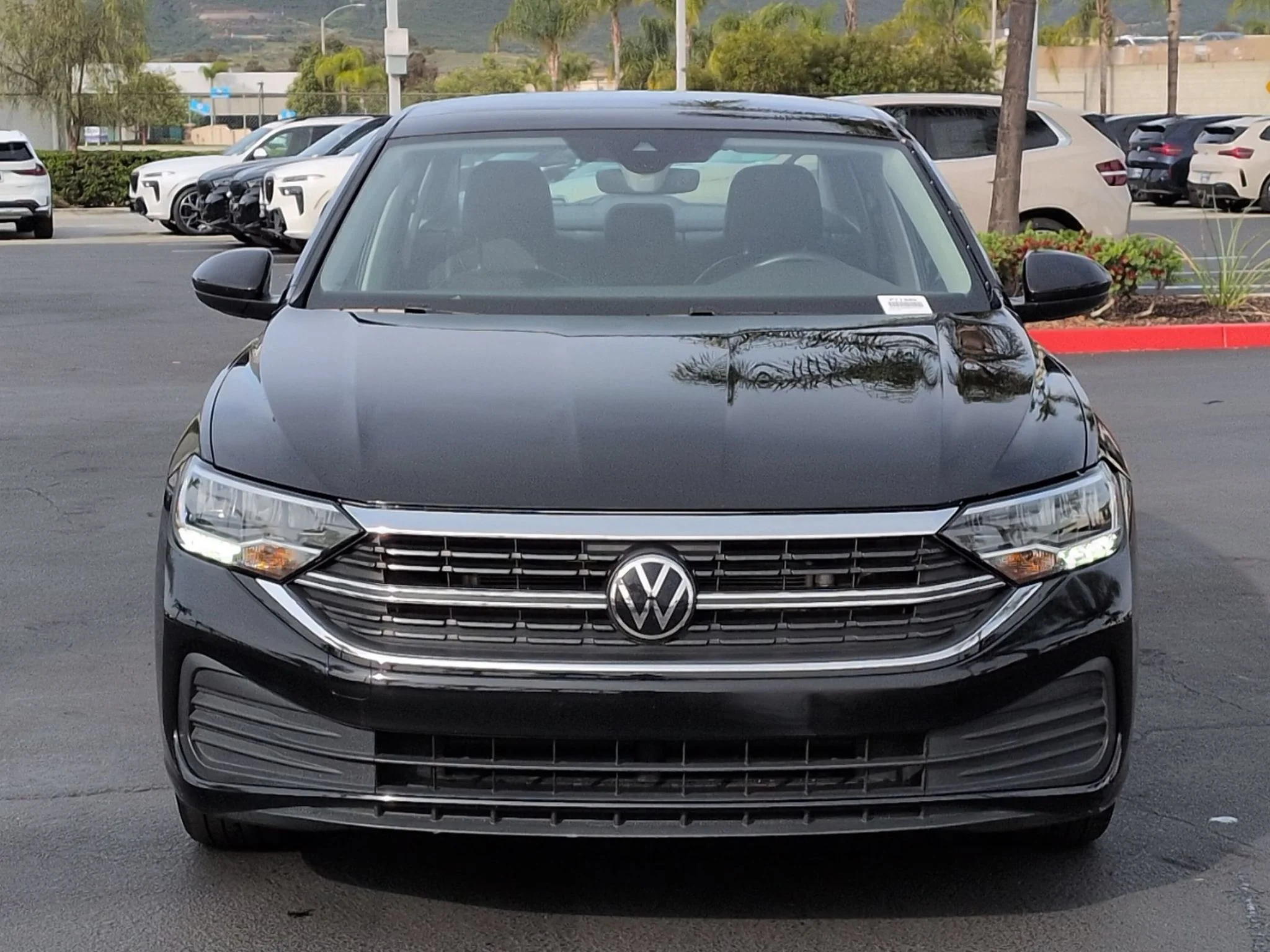 Used 2024 Deep Black Pearl Volkswagen SE w/Sunroof image 2