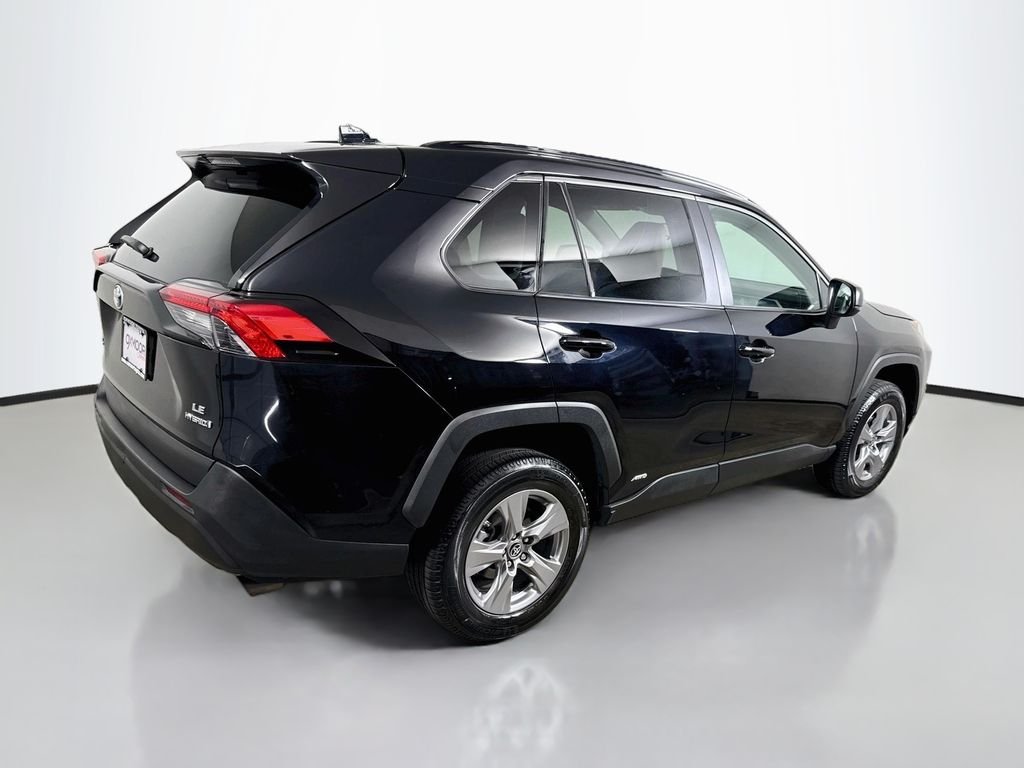 Used 2024 Midnight Black Metallic Toyota Hybrid LE image 7
