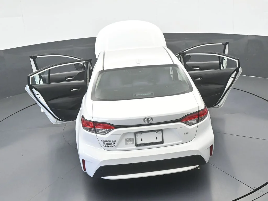 Used 2021 Super White Toyota LE image 56